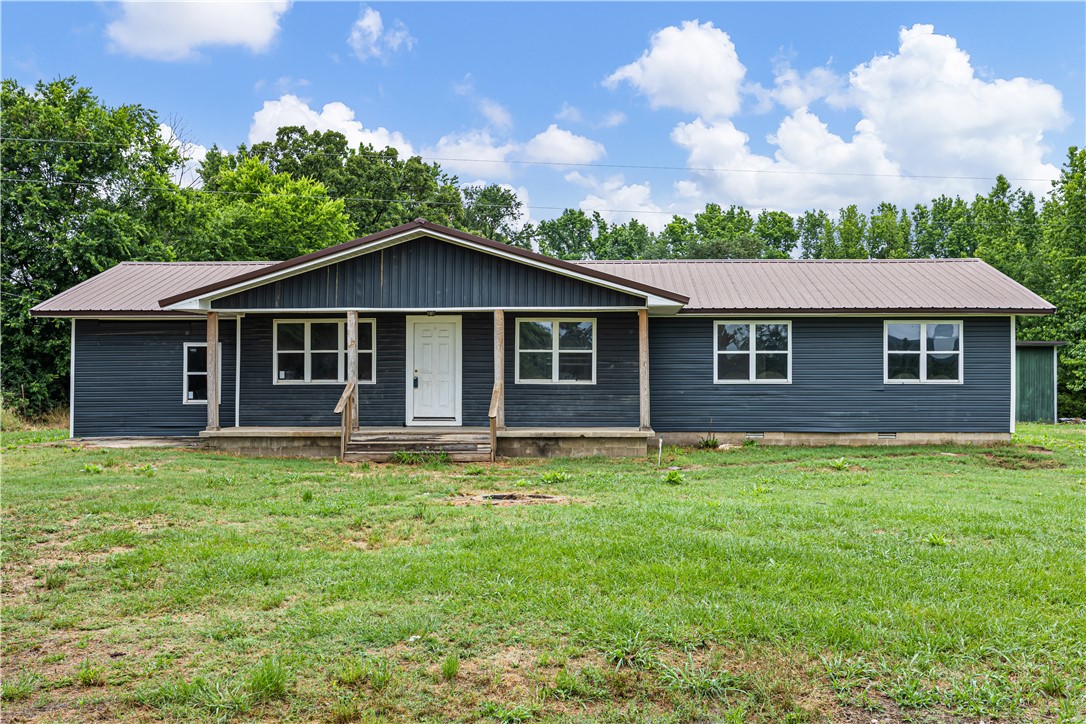 This property is a foreclosure. It will be sold "AS IS". no utilities will be turned on for any inspection.  home needs maintenance.  Very large home for the area. Quite location on private well one of the previous owners state it was the best water she had ever drank and has never run dry.  County water is available at the road but may require an easement. Priced to sale! Great investment property with limited rental properties in the area. NO TRESPASSING MUST HAVE AGENT PRESENT.