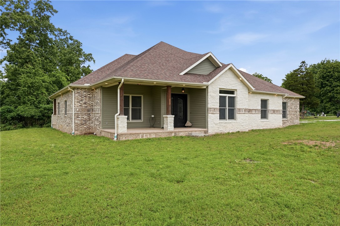 Discover the allure of a custom home that was built with love. This beautiful residence, built in 2020, is located at the end of a County Road. Very private and no thru traffic. This Exceptional home sits on 20 acres and boasts 2991 square feet. Designed for comfort, this home offers an exceptional opportunity for those seeking a refined lifestyle where you can truly relax. In Addition to the home there is an adjacent pre-poured concrete foundation onsite  that is, electric, water and septic ready. This opens the possibility for a shop and or additional structures to be added. The home features many upgraded items to include an expansive kitchen, stainless steel appliances, convection oven, oversized island, granite countertops, custom cabinetry, propane stove and thoughtful touches at every turn. The home features a whole house back up Generac, and an underground propane tank. An Additional 10 Acres can be purchased for a combined 30 acres total, see MLS 1346777. The time is now, Don't miss your chance!