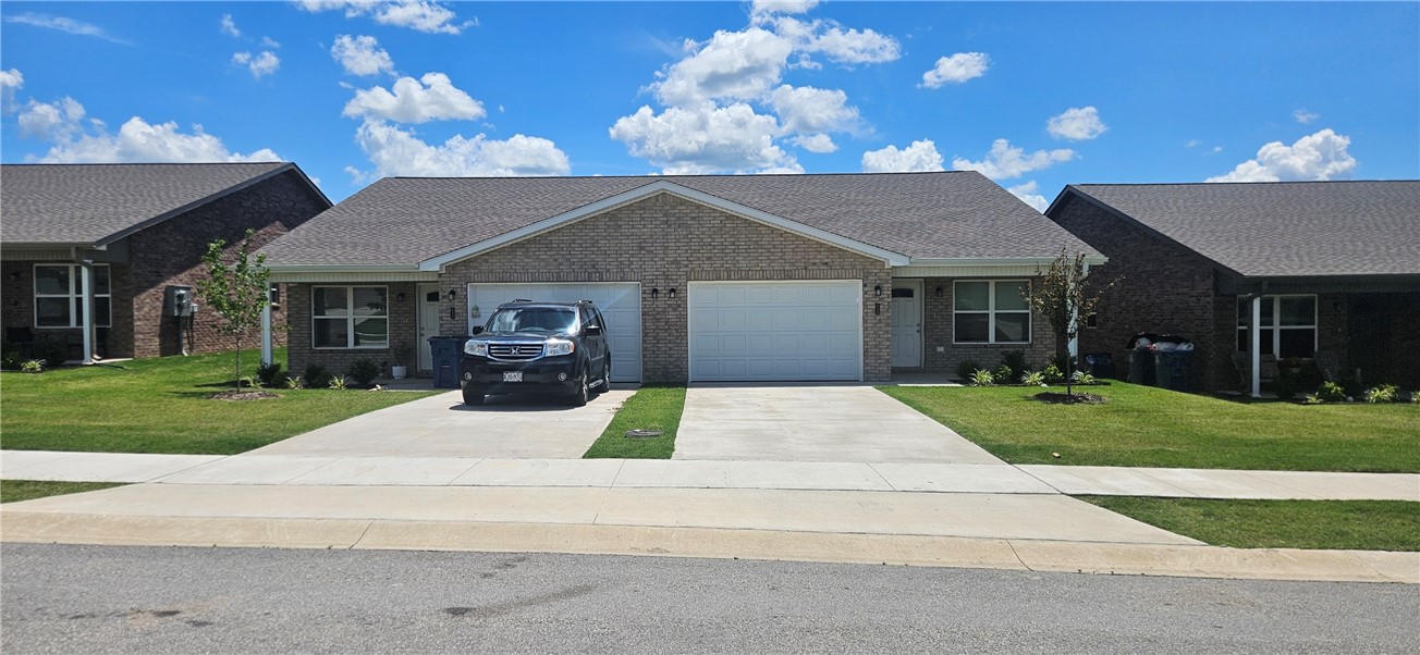 Brand new duplexes in Bentonville close to NWA Regional Airport for lease. Home features 3 bedrooms, 2 bathrooms, 2 car garage, LVP throughout home, granite countertops, ceiling fans, open floorplan, covered back patio for grilling/entertaining, fenced in yard and all appliances included. One month free rent on a 13 month lease signed by August 1, 2026.
