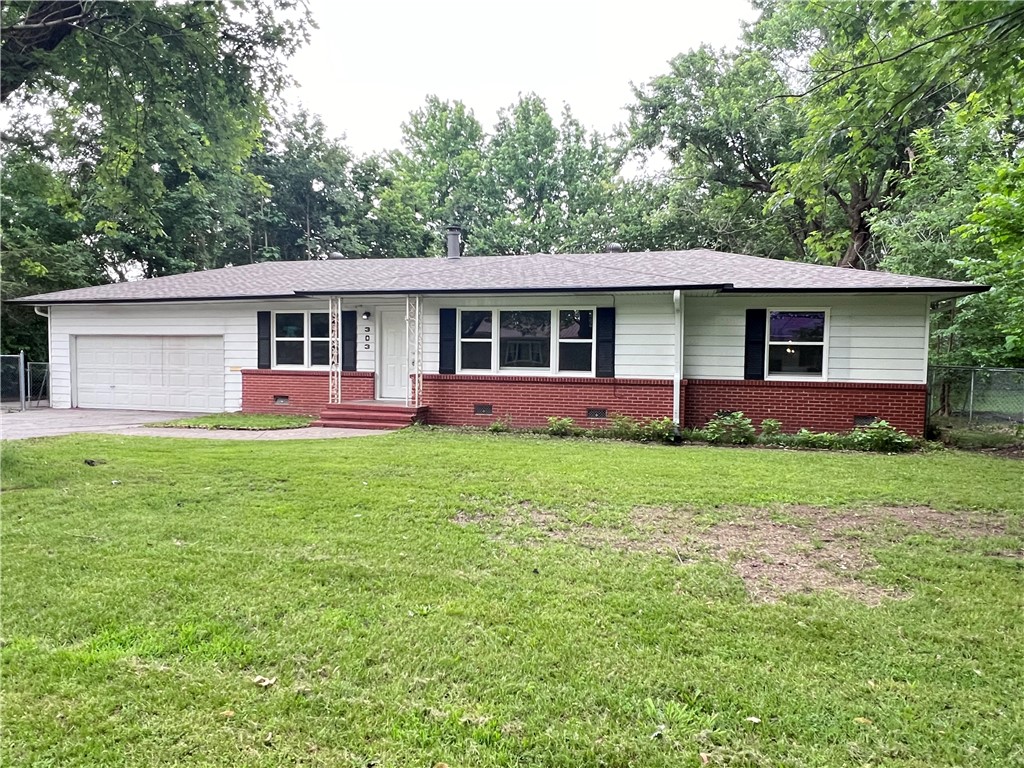 Available Today! Clean 3 bedroom 1 bath, hardwood floors and tile through out, Nice size living room, Dining room, spacious kitchen, 2 car garage with extra parking, large fenced back yard, close to schools, shopping and all that NWA has to offer. Pets are negotiable, No Cats. $40 application and processing fee per adult.