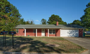 Back on the market due to previous buyer financing issues, This cute home is ready for new owners. Property cannot be shown until 10/18. Located in southwest Russellville, this home is located in Sequoyah Elementary zone and is still situated close to downtown ammenities. This home has 3 bedrooms, 2 bathrooms, a large laundry room, 2 car garage, an open concept, covered front porch, gas fireplace, and outbuilding. Updates to the home in 2014 include paint, h&a, sinks, counter tops, light fixtures and others!