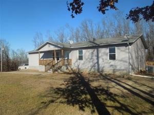 GREAT LOCATION between Harrison and Omaha.  This cute 3 BR 2 BA home is very well maintained and sits on 8.34 acres m/l with a great view! Room sizes are approximate.