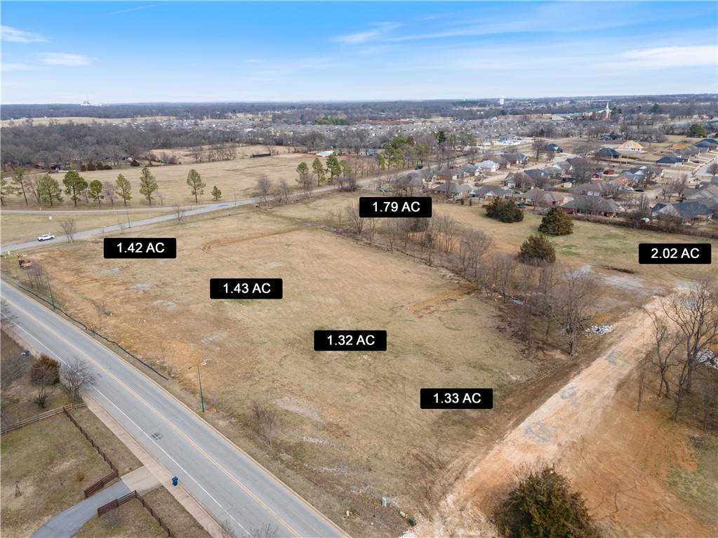 ASK ABOUT BUILD TO SUIT OPTION! BRAND NEW SUBDIVISION IN CITY LIMITS OF SILOAM SPRINGS ON LARGE LOTS! Park-like setting! Great location on North side of town! Close to John Brown University, Downtown Siloam Springs, Public Schools, Parks, and shopping etc! 11 lots for sale! See additional MLS listings for additional lots. This listing is for Lot 3, which is located with entrance on N Dogwood St, 1.79 acres +/-. Build your dream home here! Beautiful setting with easy access to everything you love! New parcel numbers to be assigned.