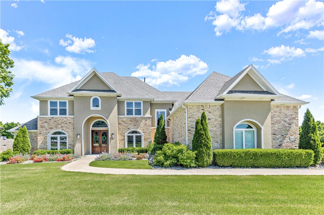 Pool, check. Prime location, check. Bentonville school district, check. Theatre/game room, check. Office, check. Top of the line Thermador appliances, check. Entertainers dream home, double check! This home really does HAVE IT ALL! Beautifully cared for one-owner home in desirable Otter Creek subdivision, this home offers incredible privacy with .82 acres of land surrounded by protected land creating the feeling you are out of town all while being right in the heart of NWA. The rock accents, wood beams and cool color tones will make you feel right at home the moment you walk through the door. Be sure to come over to see it in person because the features of this custom home is a long list & you have to see it for yourself! Come join us at this diamond property for the *Open House on June 5th from 1:00 PM - 3:00 PM
