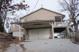 SELLER SAYS TO MAKE AN OFFER!!!  This home was built for privacy with an extreme view. You can sit outside on the covered deck and enjoy the breeze while taking in the extreme views to the south.