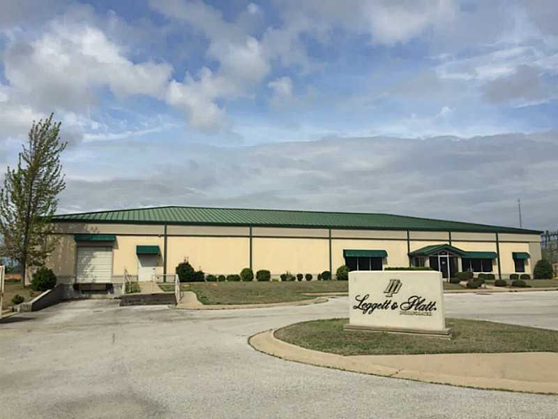 Located centrally between Walmart & Sam's home offices.   Has a dock high dock with 22 parking spaces