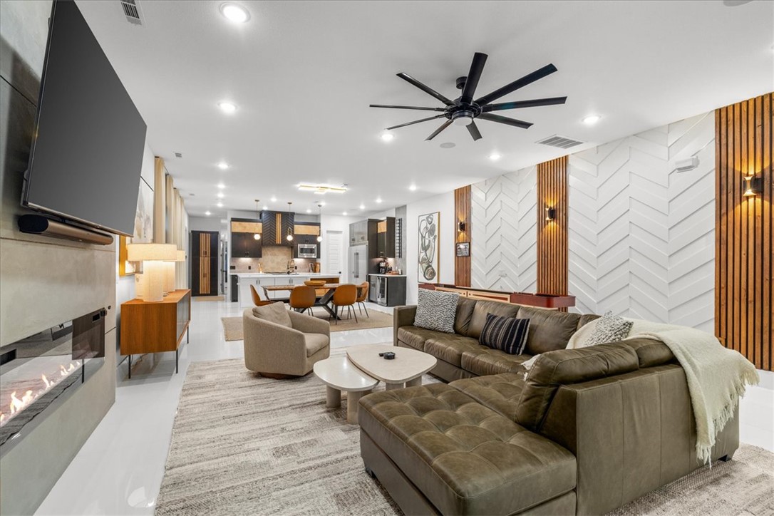 Welcome to the north side of Downtown Bentonville. From your front door, walk to Crystal Bridges, grab coffee at Airship, or bike to the Flyover Bridge & connect to the Greenway—giving you access to all of NWA. Designed to perfection! Being sold fully furnished. Currently operating as a STR. Kitchen features a 72” refrigerator, GE Cafe gas range, walk-in pantry, & built-ins. Each bedroom is generously sized & all have private en suite baths. The main-level bedroom opens directly to a private courtyard through sliding glass doors. Upstairs, the primary suite is beautifully appointed, while the third bedroom has its own private balcony. The secondary living area provides the perfect flex space for a media room or home office. The fenced side yard offers a functional space for pets or your garden. Detached 2-car garage w/ EV outlet & bike racks, storage shed, & attic storage. Perfect opportunity for a lock-and-leave in Downtown Bentonville or STR investment. Shows like a dream, a must see!