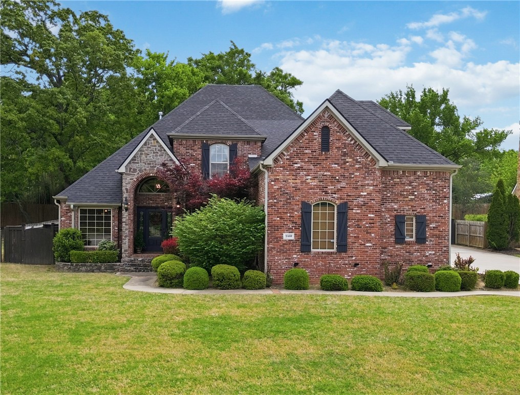 Custom-built and timelessly designed, this exceptional home in sought-after Covington Park offers classic character, quality craftsmanship, and a layout that lives beautifully. A dramatic entry welcomes you inside, where a dedicated study with rich built-ins creates the perfect work-from-home space. The main living area is anchored by a striking rock fireplace and custom cabinetry, delivering warmth and sophistication a classic design that stands apart from today’s typical modern finishes. Spacious yet cozy, this home truly lives large., The primary suite is a true retreat with a sitting area  & it's own spa-inspired bath. The oversized walk-in closet is a dream! Upstairs,  3 additional bedrooms—including one with a private ensuite—are complemented by a bonus room ideal for a 2nd living area, study zone, or guest accommodations. Step outside to an oversized covered patio with custom stamped concrete overlooking a private backyard. Recent updates include a new roof (2020), downstairs HVAC (2022), water heater (2021)