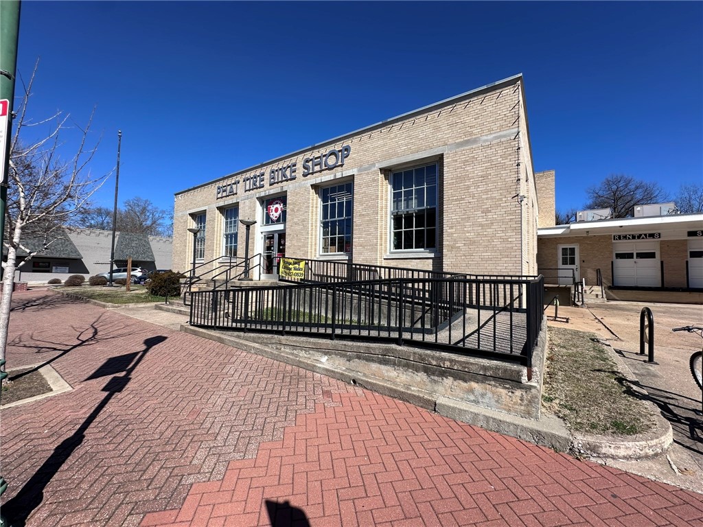 Historic building located on the corner of S Broadway St and E Central St in the heart of downtown Siloam Springs.  Situated in an Opportunity Zone.  Loading dock area with 3 roll up doors.  Many of the building's historic features have been preserved.  Two blocks from the Twin Springs Park to the south and two blocks to the City Park to the west. Surrounded by numerous shops and restaurants.