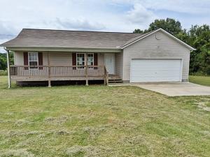 You'll love the country setting on this one with open split floor plan, master walk in closet, all electric, 2 car garage, near level lot & cathedral ceilings, in living room, kitchen & dining room. Located just off pavement approx 6 miles from town. All #'s are approx, age & sq footage per assessor, buyer to verify existence of septic.  This property may qualify for Seller Financing (Vendee).