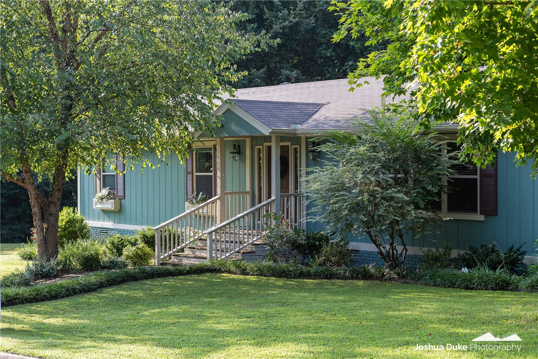 Sophisticated ranch-style home located in the middle of Fayetteville's popular east side and is just a short walk to Gulley Park. Renovated by Mark Zweig, Inc. in 2015, this charmer sits on almost .50 acres and features 3 bedrooms (all with walk-in closets), 2 full bathrooms, spacious living room and kitchen, large deck for entertaining & plenty of storage. The current owners have added new hard surface flooring in the living/kitchen/hallways, privacy fencing, and front landscaping.