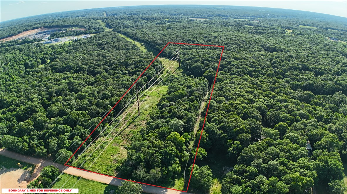 10 acres ready for you to build your dream home, a cabin in the woods, or to have fun with the family! Partially wooded acreage just off Hwy 102 & Bethlehem Rd. Great location - only 7 minutes to Centerton, 12 minutes to Decatur, 18 minutes to Gravette. Old mobile & partial home site need removed. Previously used well near the homesite would need a pump. Buyer to verify all utilities for rural/public water. Electric easement on the south side.