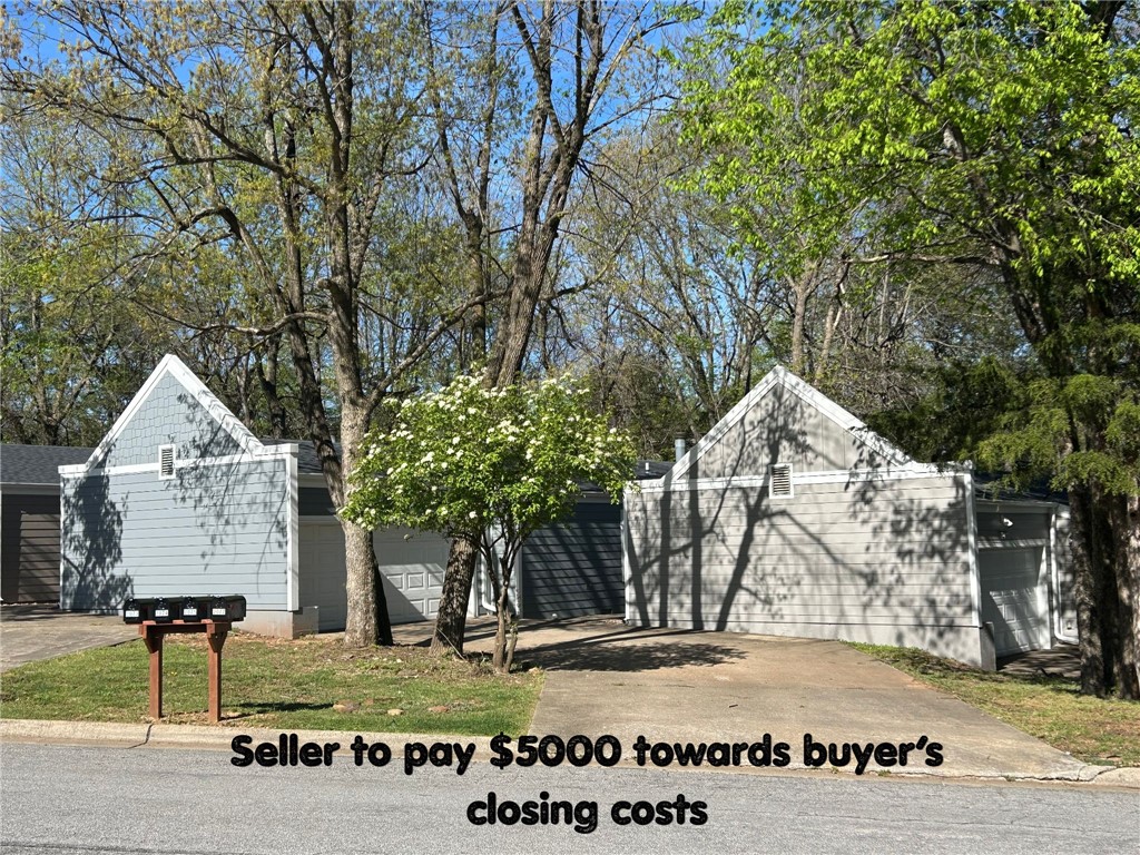 Beautifully renovated home in East Fayetteville - steps from Gulley Park.  Welcome to this fully updated 2 bed, 2 bath home located just a short walk from Gulley Park, local trails, and popular restaurants, and only minutes from the U of A and the Entertainment District.  Nearly every inch of this home has been refreshed, including a new roof, gutters, windows, Hardie siding, interior and exterior paint, LVP flooring, quartz countertops, and stainless steel appliances.  The thoughtful split floor plan features a lovely living room with built-in bookcases and a cozy fireplace - perfect for relaxing or entertaining.  The updated kitchen offers modern finishes and convenient access to the pantry, utility room, and a 2-car garage.  Located in a quiet, established neighborhood, residents enjoy access to a park with a walking trail, a community pool, and tennis courts.  A renovation of the pool and tennis courts is already planned, adding even more value to this property.  This home is a must see!