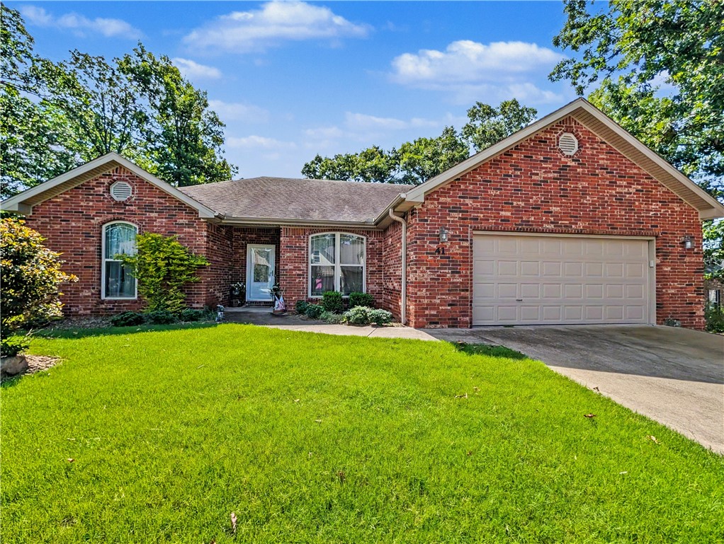 Welcome To Your Next Home, A Brick Front Offering Nice Clean Curb Appeal, That's As Clean As It Is Smart, Tucked Into One Of Bella Vista's Quiet Established Neighborhoods With Quick Access To 71B And Sought-After Bentonville Schools. The Layout Is The Star Here, And It's The Kind You Just Don't Get In New Builds This Size. Two Counter Bar Seating Areas, Formal Dining For The Holidays, Eat-In Dining For Tuesday Night Tacos, Take Your Pick. The Living Room Opens Up Under A Soaring Vaulted Ceiling, And The Front Bedroom Carries That Same Airy Feel. Then There's The Primary Suite, And It's A Big Deal: Room For A Sitting Area, Plus Its Own Door Straight Out To The Back Deck For Morning Coffee Before Anyone Else Is Up. Solid Wood Cabinets Throughout, A Split Plan That Keeps Everyone Happy, And Fresh New Carpet So You Can Move Right In. Out Back, The Deck Looks Over A Flatish, Low-Maintenance Yard Framed By Mature Trees. Add A Two-Car Garage And A Home That's Been Loved In All The Right Ways.  This Is The One!