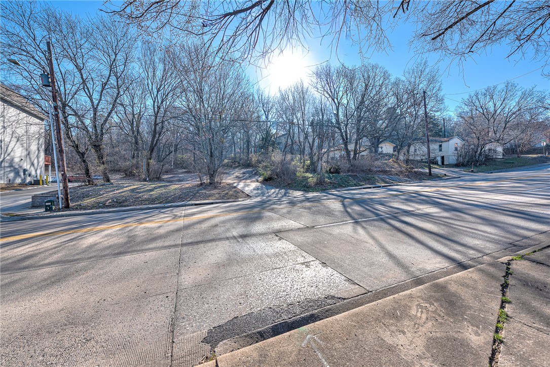 Prime multi-family development opportunity just minutes from the University of Arkansas campus! This RI-12 zoned property offers outstanding potential for investors and developers looking to capitalize on Fayetteville’s strong rental market. Surrounded by established apartment communities and residential neighborhoods, the site features a wooded setting with elevated views and convenient access to N Gregg Ave, major corridors, shopping, dining, and campus amenities.

RI-12 zoning (Residential Intermediate – 12 units per acre) allows for attractive density options ideal for student housing, long-term rentals, or a boutique multi-family project. Utilities are nearby (buyer to verify), and the property’s location near existing developments supports strong future demand.

Whether you're planning your next income-producing project or expanding your portfolio in one of Northwest Arkansas’ most desirable rental markets, this is a rare opportunity in a high-growth area close to the University of Arkansas.