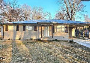 This beautifully updated home located on a quiet street, features a spacious back yard and new back deck. A back door was added to be able to access the backyard and deck conveniently. The new exterior paint gives this home a beautiful curb appeal and it has many updates including being converted back into a 3 bedroom. It has a new HVAC system, new added dishwasher, new plumbing, gutters, paint, light fixtures, refurbished hard wood floors, and a gorgeous renovated bathroom. The metal roof is only 2 years old. This home is move in ready without the worry of needing any updates!  It is conveniently located near restaurants, shopping, schools, and Arkansas Tech University.  This home is being sold AS IS. Electrical has been updated and brand new water heater has been installed.
