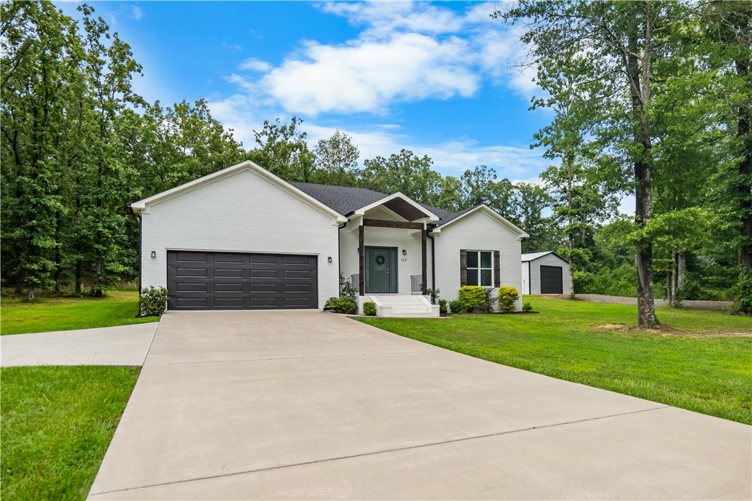 Better-than-new custom-built home on a spacious one-acre lot just outside Conway city limits, offering the perfect blend of modern comfort and country living. With over $65,000 in upgrades that include a 30x40 insulated shop with a 10x16 garage door, soaring 15-foot ceiling, 6-inch reinforced concrete slab, 200-amp electrical service, and expanded concrete landing. A premium 6-person hot tub with hot/cold therapy and dedicated power, plus a covered patio perfect for relaxing.

This split-floor-plan home features fresh interior paint, 4 bedrooms, 2.5 baths, and walk-in closets in every bedroom. The private primary suite includes a spa-like bath with a custom walk-in shower.

The open-concept layout showcases 10-foot ceilings, a newly added LED fireplace with shiplap accent wall, custom cabinetry, quartz countertops, stainless steel appliances, and luxury vinyl plank flooring throughout.

Enjoy peaceful country living just minutes from schools, shopping, dining, and everyday conveniences.