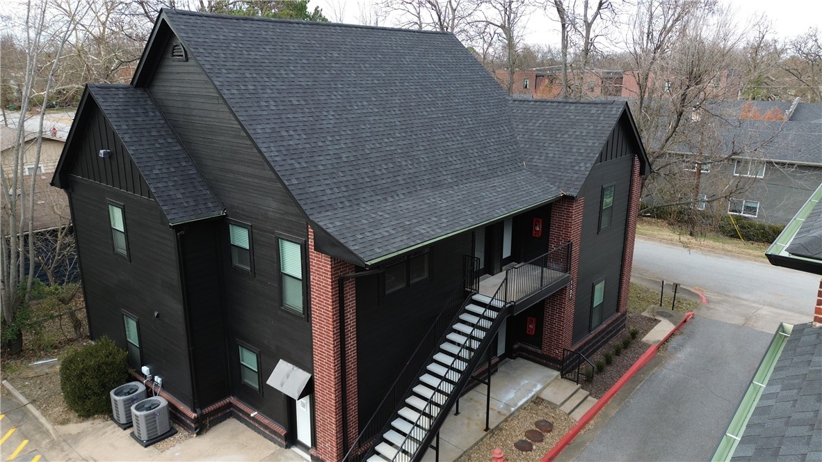 North Corner Condos - Luxury, Security & Location, All in One. Newly renovated & just steps from the
University of Arkansas, North Corner Condos is a boutique 19-unit community perfect for students or
investors. Unbeatable Location: Very close walking distance to University of Arkansas, Razorback
Greenway, Dickson Street, Goat Lab Brewery/Restaurant shops, & bus stop at your door. Fully Renovated:New roof, windows, paint, gutters, and HVAC—move-in ready & low-maintenance. Modern Interiors: 3 designer packages include granite counters, premium fixtures, full appliance sets. Secure Living: Owneronly access to upper floors, keyless entry, cameras, & fire suppression system. Whether buying for your student or as a smart investment, North Corner Condos offer prime real estate in Fayetteville’s most desirable student hub. Multiple units with several different floor plans available. 2 and 3 bedrooms, all 2 full baths. Images featuring staged furniture depict model units. Individual units may vary in layout and finish.