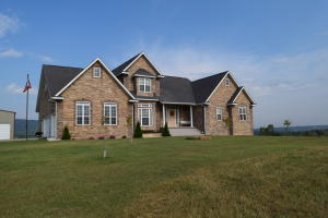 Beautiful, custom-built home w/ 5 BD, 3 full BA, and 2 half BA on 20 acres.  Amazing views of Gaither Mountain & the Valley! Near the Buffalo Nat.River Abundant natural light with large well placed windows. Dream kitchen comes w/ double oven, rich hardwoods, and granite countertops.  Amenities include zoned heat/air on 3 floors, butler's pantry, 1800 sq ft shop with RV storage.