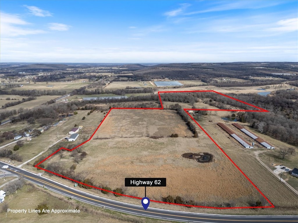 Peaceful 46.48-acre tract offering a perfect mix of open pasture and natural beauty with Highway 62 frontage and Lincoln water at the road. Multiple prime homesite options overlook two ponds, ideal for relaxing, fishing, or simply enjoying the views. The partially wooded back acreage provides privacy and great hunting, with plenty of room for trails, livestock, or recreation. With room to build your dream home, mini-farm, or family compound, this property offers flexibility for building, farming, hunting, or long-term investment. Potential to add an additional entrance off Hwy 62 for a separate access to the back field (subject to approvals). Come create your own slice of the countryside just minutes from town.