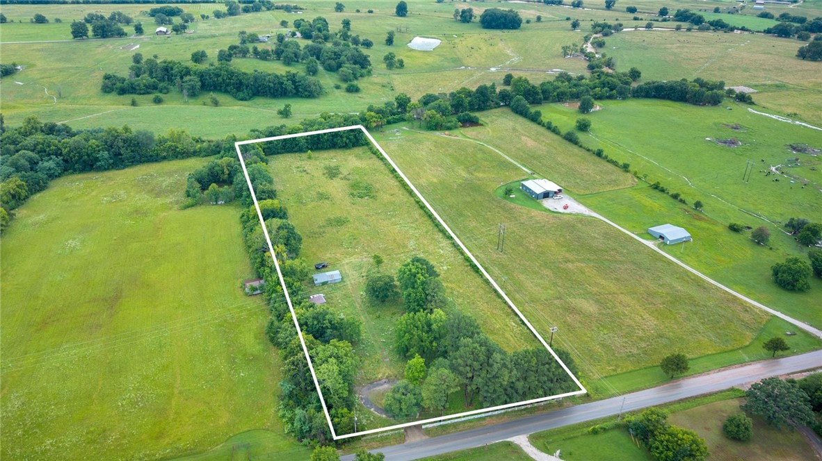 Exceptional opportunity in the growing Prairie Grove area! This beautiful, level acreage offers endless possibilities for builders, developers, or those looking to create a private estate. With the potential for approximately one home per acre (subject to county approval and verification), this property is ideal for a small development or multiple estate-sized homesites. Prefer your own private retreat? Build your forever home with plenty of room for a shop, pool, animals, or outdoor living. Conveniently located just minutes from major highways, providing an easy commute to Fayetteville, Farmington, and the rest of Northwest Arkansas while still enjoying peaceful country living.