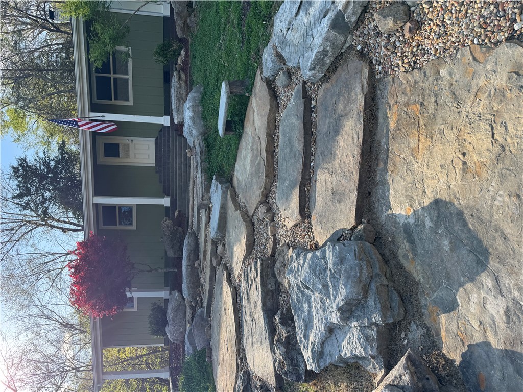 Your Dream! One of a kind ten acres, creek running throughout property with scenic large rock formations. Newly remodeled, updated 3 bedroom home (1350 sq Ft): new electrical, plumbing, cabinets, and appliances. Great room with dining area featuring gorgeous views. Enjoy nature relaxing on your private deck. Other possible building sites on property. Additional acreage available. Located in northern Arkansas, about 45 minutes south of Branson MO. Harrison AR (population 13,000) is the nearest town for all your shopping needs.