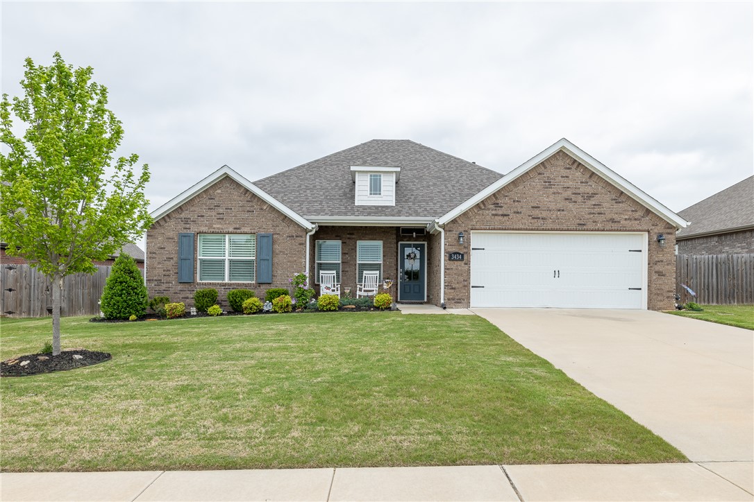 Looking for a home with a TON of upgrades in pristine condition?  This is IT!!  Located in East Springdale's Hylton Place S/D this home features 1,800 heated and cooled sq ft, 4 bedrooms, 2 full bathrooms, open eat in kitchen to living, and laundry.  Upgrades include Plantation Shutters, Hardwood Flooring throughout (NO CARPET), Dual shower heads, frameless glass shower doors, 5 burner gas range, fully fenced backyard, BRAND NEW ROOF IN 2025, upgraded Dishwasher, and free standing shed.  Other amenities include dual primary closets, incredible landscaping, washer, dryer, and refrigerator, and a 2 car garage.  This is a GEM for the price.  Easy access to Don Tyson Parkway and Charlie and Willie George Park!