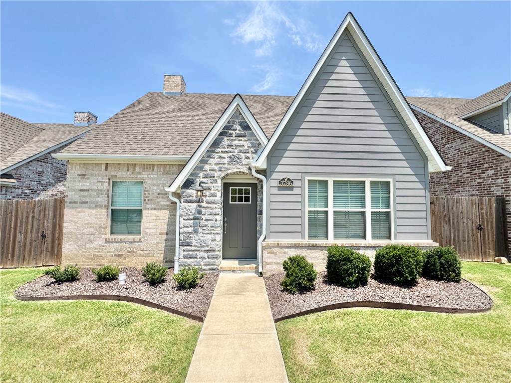 Available now! Adorable Cottage-style home in the Brooklands Subdivision. 3BR/2BA single-level home offering 1,806 SqFt in one of west Fayetteville's desirable newer neighborhoods. This well-maintained home features an open floor plan, attached 2-car garage, fully fenced backyard, and a screened-in back porch perfect for relaxing or entertaining. Refrigerator, washer, and dryer are all included for your convenience. Residents also enjoy access to the neighborhood pool. Ideally located just minutes from I-49, the University of Arkansas, Wedington shopping and dining, and the city's extensive trail system. Nearby attractions include Lake Fayetteville, the Razorback Greenway, and the Botanical Garden of the Ozarks. Zoned for Fayetteville Schools including Owl Creek Elementary, Ramay Junior High, and Fayetteville High School. Don't miss this opportunity to enjoy comfort, convenience, and all that Northwest Arkansas has to offer!