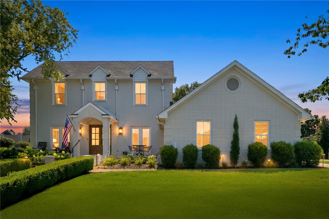Charming, exceptionally maintained, and thoughtfully updated, this beautiful home offers timeless elegance in Northwest Arkansas' premier golf community, Pinnacle Country Club. Manicured landscaping, a welcoming front walk, and a classic painted brick exterior create an unforgettable first impression. Inside, you'll find natural light, beautiful hardwood floors, and quality finishes throughout. The kitchen opens to the inviting hearth room, and the primary suite has a view of the golf course. Outside, you'll find your own private courtyard featuring mature landscaping and a covered pergola, creating a great space for relaxing evenings or entertaining guests year-round. Enjoy the security and amenities of Pinnacle Country Club while being just minutes from Pinnacle Hills Promenade, Topgolf, the Walmart AMP, premier dining, shopping, and the new Walmart Home Office.