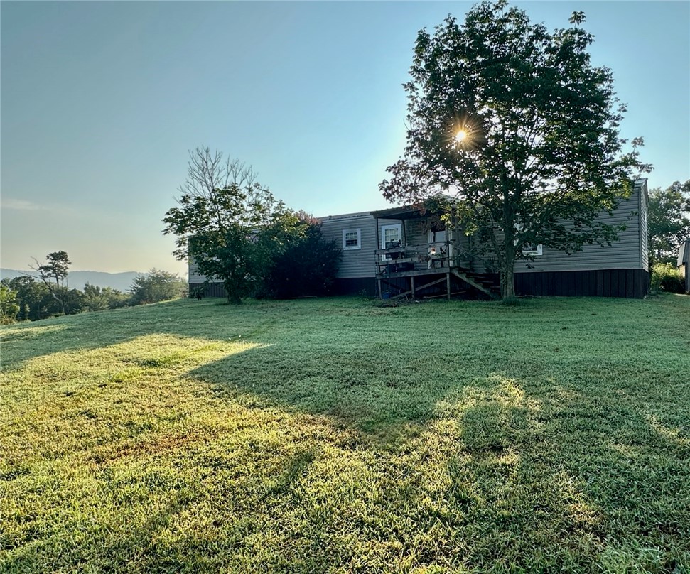 Discover this versatile money-making property offering two working chicken houses' along with a mobile home situated on approximately 28 acres of land. Perfect for farming, livestock, or a peaceful country lifestyle. *Property Highlights* Two 40x470 chicken houses, suitable for breeder operation. 14x70 Cozy mobile home providing comfortable living space in a rural setting. Approximately 28 acres of open land, perfect for farming, grazing, or outdoor activities. *Outbuildings* - 40x50 Insulated Shop: ideal for equipment storage, workshops, or hobbies. *Carport* Detached 2-car carport for convenient vehicle protection. *Safety* Storm shelter included for peace of mind during severe weather. This property combines agricultural potential with comfortable living, making it ideal for farmers, hobbyists, or anyone seeking a rural retreat. Schedule your private tour today and explore everything this unique property has to offer!