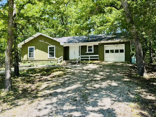 Discover the charm of Holiday Island, Arkansas, a single-family residence built in 1990 that offers a delightful living experience. This property, with its thoughtful design, presents an opportunity for comfortable and convenient living on a manageable lot. This home provides two bedrooms, offering versatile spaces for rest and relaxation. Each room is designed to be a personal retreat, accommodating various needs and preferences. Embrace the inviting atmosphere of this Holiday Island residence. Schedule your private viewing to truly appreciate the lifestyle this property offers. A few amenities of Holiday Island are 9 and 18 hole golf courses, swimming pools, lake swimming, a full service marina, Country Club, trails, and much more.