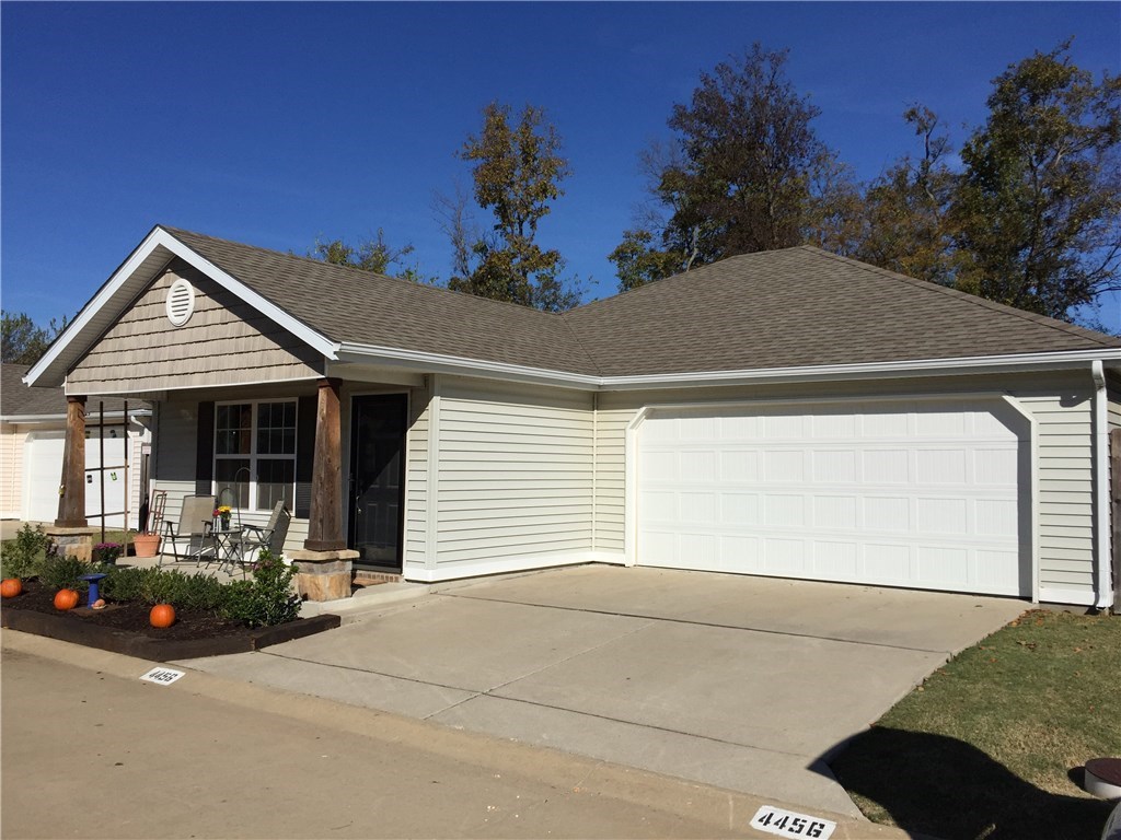Cottage style 3 Bedroom/2 Bath home convenient to the University of Arkansas. Open floor plan with high end laminate flooring throughout. No carpet! Lots of natural light. 2 car garage, Fenced in backyard. Backs up to green space. Available 8/1. This is a non-smoking property. Security deposit $1495. A pet is negotiable.  Showings should start on 7/14.  Property is agent owned by Jason Benham who is an agent with Bassett Mix & Associates