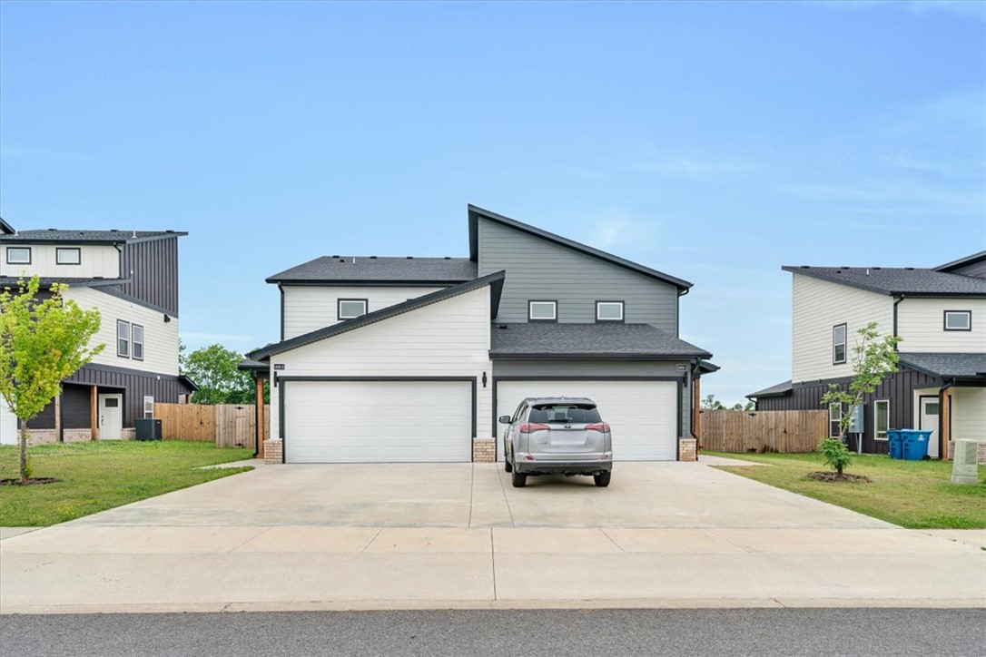Modern duplex in the heart of Bentonville’s booming southwest corridor. Built in 2024, this low-maintenance home has quartz countertops, luxury vinyl plank flooring, stainless steel appliances and a fully fenced backyard. One unit is currently rented at $1,650/month through 6/30/2027. The other unit is vacant and move-in ready! We have a standby tenant for this unit if you want as an investment property. Each unit features 3 bedrooms, 2.5 bathrooms, and a 2-car garage with the primary bedroom on the main level and an open concept floor plan. Preferred lender credit available. Near major employers, Walmart Headquarters, and downtown Bentonville in one of the fastest growing regions of the country. Walk to Bentonville's new Creekside Park featuring 35 acres, pickleball courts, splash pad and access to the Little Osage Trail which connects to Coler Mountain Bike Preserve and the Razorback Greenway.