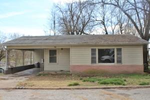 Great rental potential with great rental history, having been rented for $400/mo for several years, near level lot with large living room and Master bedroom. Agent owned. All #'s are approx, age is estimate, sq. footage per assessor.