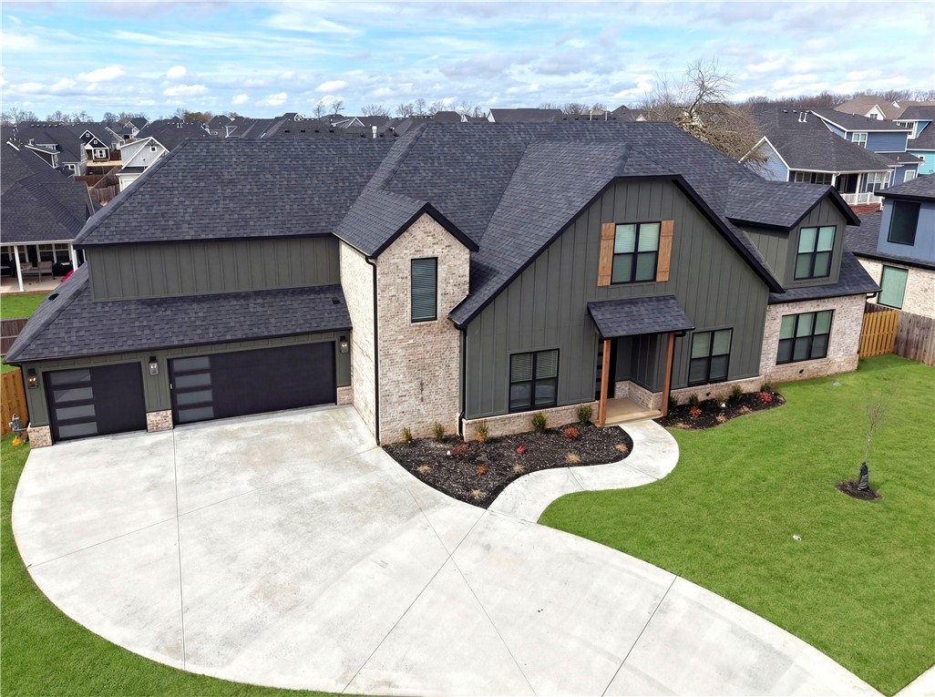 Don't miss out on the LAST available C3 Custom Home in Sky Valley - a community in the heart of West Rogers, This Maverick Plan offers 3,486 square feet of well-designed living space, featuring four bedrooms and three and a half bathrooms plus an office. From the moment you step inside, you're greeted by high ceilings and an open, airy floor plan that seamlessly connects the living, dining, and kitchen areas — ideal for both everyday life and entertaining.On the main level, you'll find a dedicated home office and a spacious primary suite with a luxurious bathroom and direct access to utility room along with a half bath downstairs for your guests. Upstairs, are 3 additional bedrooms. One includes a private en-suite bath, while the other two share a bathroom. Schedule your showing today!