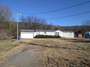 Super cute Mobile Home with 3bd 2baths, Fireplace in living area, open dining and living area, new cabinets and countertops in kitchen, sold as is, but sellers will leave the floor covering.double car garage with large extra storage and shelves.
