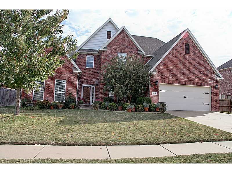 4 bedrooms with possible 5th bedroom or may be used as office or play room.  1st floor master suite with enormous bathroom/closet, granite kitchen counters, 2 living areas downstairs each with gas log fireplace, formal dining room, large pantry, laundry room has space for additional refrigerator, irrigated yard.  Covered 18x12 back deck.