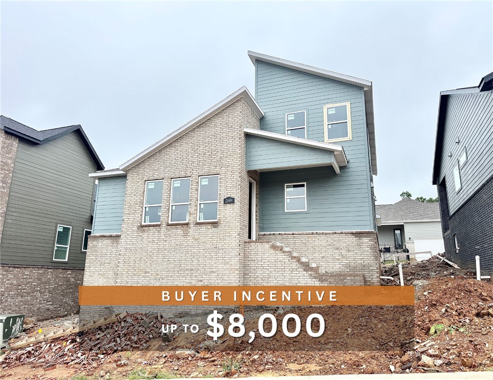 Discover this stunning modern home in the perfect East Fayetteville location—just a short walk to beloved Gulley Park! Douglas floorplan featuring designer finishes throughout! Enjoy a spacious open floorplan with a large living room, electric fireplace with tile to the ceiling, and beautiful wood flooring. The chef’s kitchen boasts 3cm quartz countertops, stainless steel frigidaire professional-grade appliances, custom cabinets to the ceiling with soft close door hinges, vented hood, and a walk-in pantry. The luxurious primary suite includes hardwood floors, custom beams, and a spa-like bathroom with walk in tile shower, soaking tub, double sinks and walk in closet. With a formal dining area with wainscot, cubbies to keep you organized, large covered patio, and included blinds and gutters, this home blends comfort, style, and convenience in one unbeatable package. POA maintained lawncare and access to Niokaska Creek Trail from the neighborhood!!