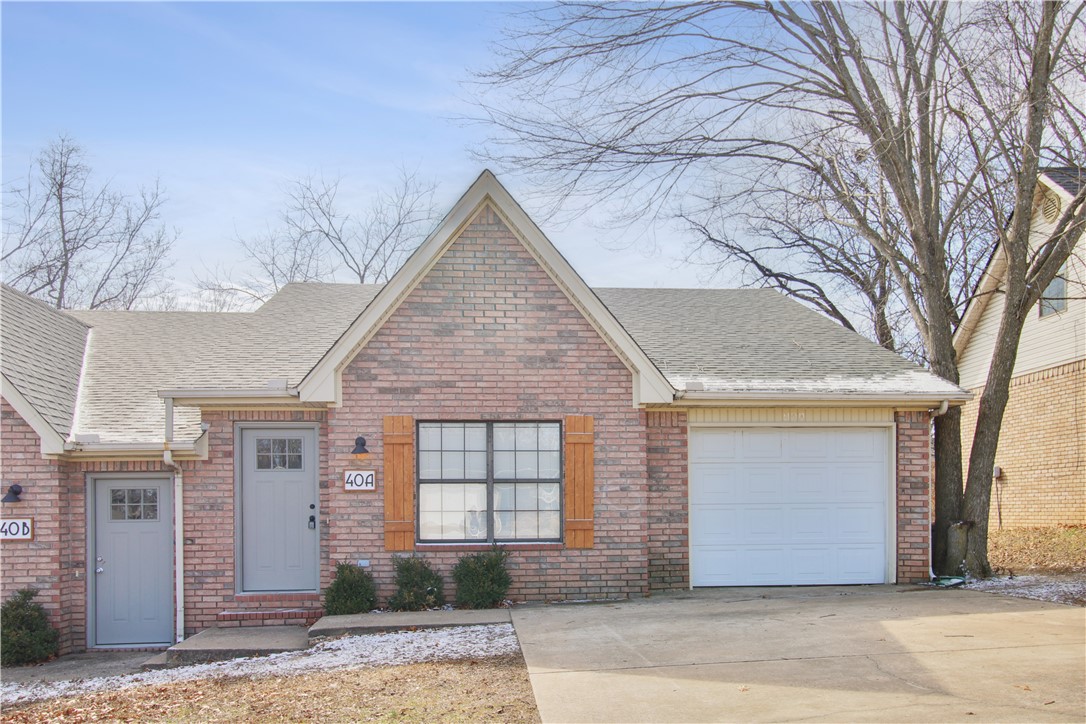 Attention investors! Opportunities like this in the heart of Bentonville don’t come around often! Fully renovated & ideally located, 40 Holly Drive is just minutes from Downtown Bentonville & approximately one mile from the Bentonville Square, placing tenants near premier dining, shopping, entertainment, local schools, the Razorback Greenway, & some of the area’s most popular bike trails. Each unit offers 3 bedrooms & 2 bathrooms with stylish modern finishes throughout, including luxury vinyl plank flooring, granite countertops, & a spacious primary suite featuring a walk-in glass shower. With Bentonville’s continued growth & strong rental appeal, this duplex is an excellent opportunity for investors or owner-occupants seeking convenience, quality, & long-term potential. Property is tenant occupied — please do not disturb residents.