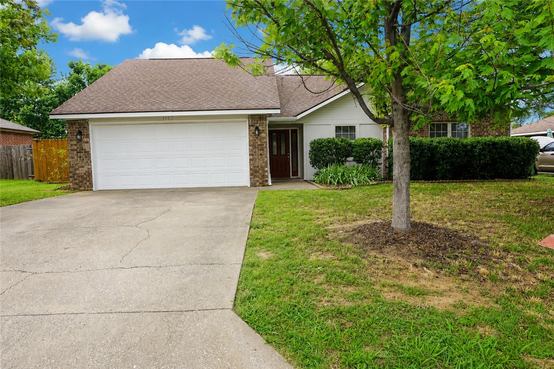 Beautifully updated 3-bedroom, 2-bath home backing directly to Bentonville High School! Extensively renovated approximately eight years ago, this home features updated kitchen cabinets, countertops, flooring, light fixtures, and electrical outlets and switches throughout. The spacious family room with a cozy fireplace offers durable luxury vinyl plank flooring, while the bedrooms feature newer carpet for added comfort. Enjoy the fully fenced backyard—perfect for pets, play, or entertaining—and a two-car garage complete with a built-in workbench for projects and storage. Conveniently located near shopping, dining, schools, and medical facilities, this home combines comfort, functionality, and an unbeatable Bentonville location. Schedule your showing today!