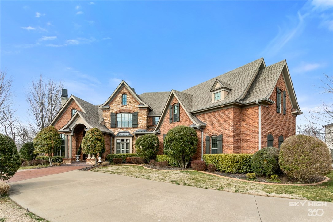 This parade home build by Tim McMahon is an entertainers dream! Featuring large windows throughout, open floor-plan, hardwood flooring and more. The kitchen is open to the hearth room giving the home an open elegant feel featuring custom granite, two toned cabinetry,a free standing island and plenty of cabinet space.Outside you'll find a three tiered deck which offers a rare view of the blessings golf course and includes a brick lined gas burning fireplace as well as an outdoor cooking area to entertain guests. The study sits to the left as you enter the home and leads you to the expansive master suite. Master suite offers entry to the private back deck as well as the formal living room. The formal living room is elegant boasting a window lined wall and high soaring ceilings. Upstairs you'll find three bedrooms each with their own private bath as well as a custom media room complete with surround sound and theater seating. This home is a must see!
