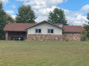 Come check out this recently updated home in great location between Dover and Russellville.  Large living room with cathedral ceilings and wood burning insert to keep the family cozy. Updated in the last 4 years are a/c unit, hot water heater, flooring, exterior and interior paint, countertops, and walk in shower in hall bath.  This home can be 4 bed or 3 bed with a huge bonus room/man cave/game room, whatever fits your family best.  Sits on 2.2 acres with a community pond for all the neighbors to enjoy. Chain link back yard for all your furry friends. Don't miss out on this one!