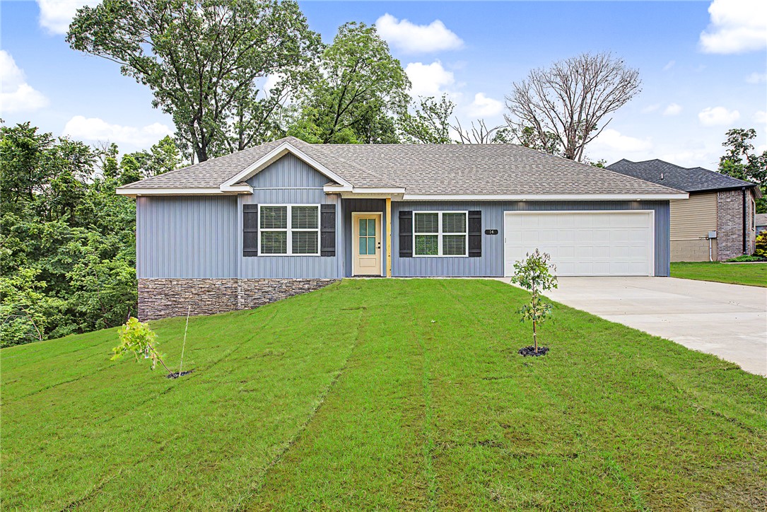 Welcome to Bella Vista living at its finest! This beautifully designed 2-bedroom, 2-bath home offers modern comfort in one of Northwest Arkansas’ most sought-after outdoor communities. Featuring an open-concept layout with vaulted ceilings, luxury vinyl plank flooring, abundant natural light, and stylish finishes throughout, this home is perfect for full-time living, a vacation retreat, or an investment opportunity.

The spacious kitchen flows seamlessly into the living and dining areas, creating an ideal space for entertaining. The private primary suite includes a well-appointed bath and generous closet space, while the second bedroom and bath provide flexibility for guests or a home office.
Enjoy peaceful surroundings with easy access to Bella Vista’s premier amenities including lakes, golf courses, mountain biking trails, parks, hiking paths, and recreational facilities. Conveniently located near Bentonville, this property combines tranquility with proximity to shopping, dining, and the Razorback Greenway.