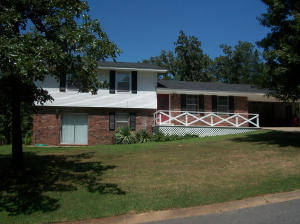 Finally get the space you need! Set on a large and beautiful West Russellville lot, this 2316 sf 3 bedroom, 2 bath home features a spacious kitchen with lots of cabinets, a formal dining room, and a downstairs den with a fireplace that is currently being used as a super-sized master bedroom! Outside you will enjoy the peaceful setting and the large deck, which is the perfect place to grill out!