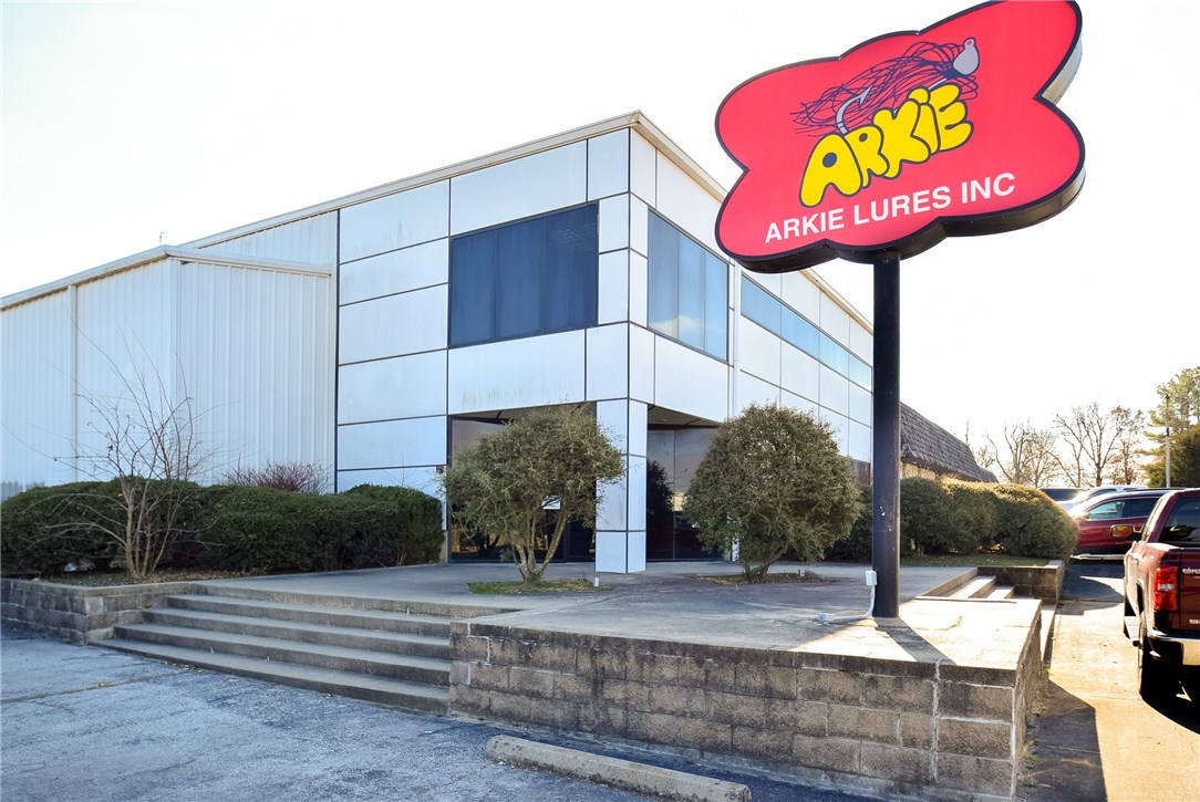 Great Buy on Manufacturing/Warehouse/Office facility in prime location with major road frontage (447' along Old Missouri and 429' along Ford St), great visibility and high traffic count!  Just across the street from Springdale Airport.   This property is located in the Opportunity Zone and provides some incredible tax incentives!  Zoned I-1.  Owner occupies half of the building and will vacate upon sale.  Tenant occupies the other half on month-to-month lease and will be relocating soon.