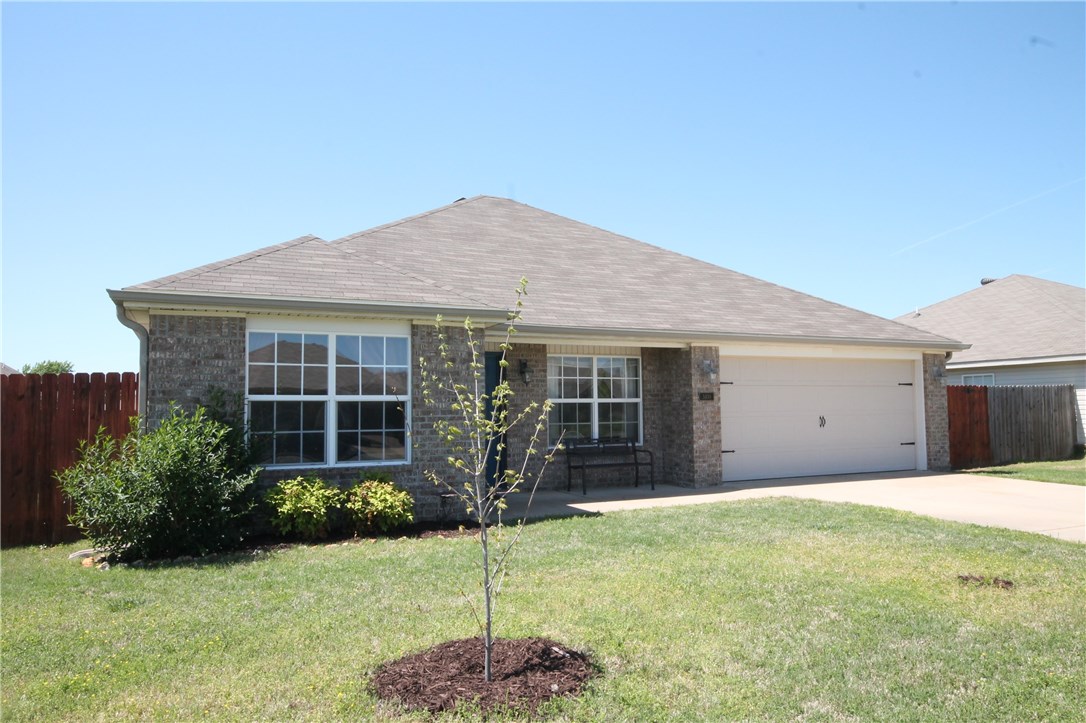 Nice 4 Bedroom home. Beautiful wood floors. The living area has high ceilings, ceiling fan and gas log fireplace. Dining area in kitchen; has a pantry and the cabinets with a Lazy Susan. Master has boxed ceiling and walk-in closet. Flat, fenced back yard with playset that conveys. This one won't last long, take a look today.