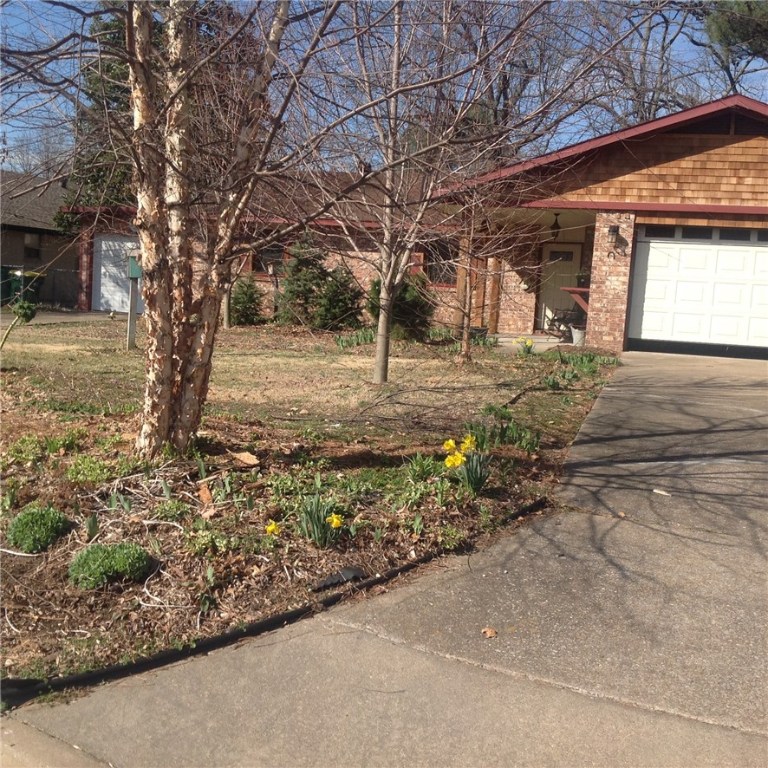 How about a fireplace in your master bedroom?  This is a charming home.  Immaculate updated kitchen all new counter tops and appliances  New energy efficient windows and doors throughout.  Fresh paint inside and out.  Beautiful open views across the street. The yard has mature trees landscaping and a garden spot. Wonderful location close to Lake Fayetteville and walking trails.