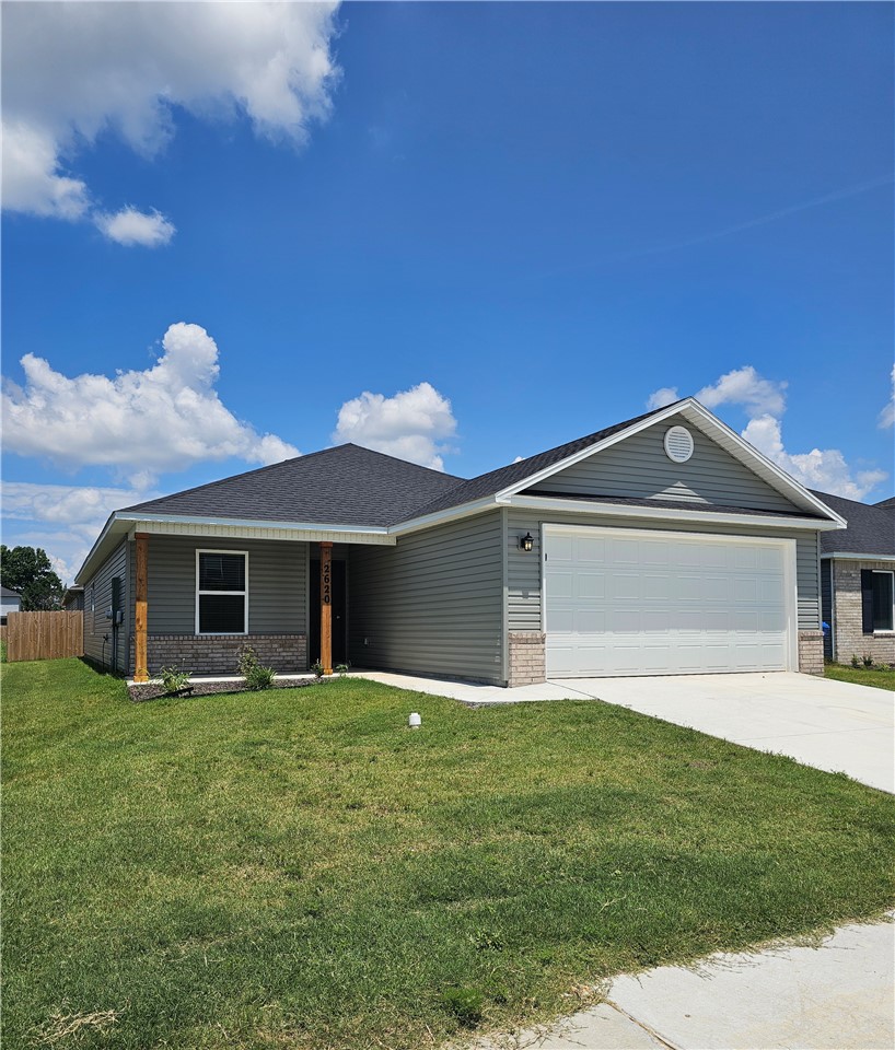 Be the first to turn this beautiful new construction into your home! This 4-bedroom, 2-bath home features a spacious garage, an open kitchen with quality finishes, and a functional layout designed for comfortable living. Conveniently located just minutes from the University of Arkansas, downtown Fayetteville, parks and biking trails, you'll enjoy easy access to everything while still being away from the hustle and bustle of city life.
