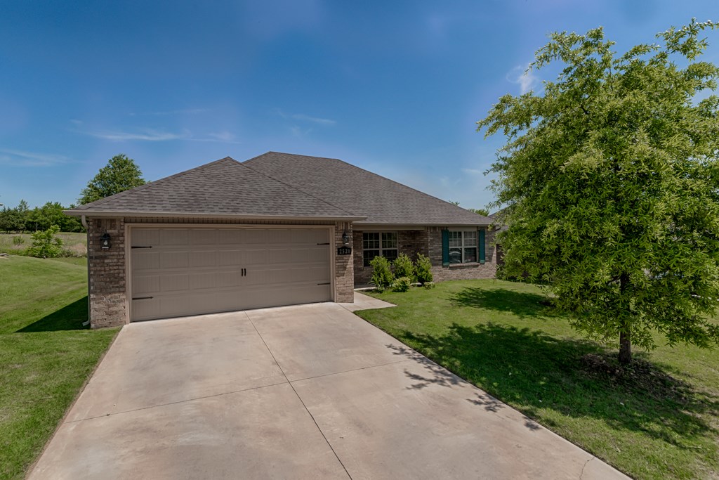 Beautiful home with all brick exterior , covered front porch, stainless steel appliances, pantry, lots of cabinet space, beautiful wood floors, high ceilings, split floor plan, spacious bedroom, walk-in closet, double vanity in master bathroom, lots of common property in back , gutters, and much more.