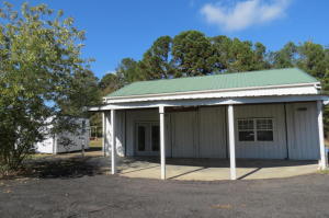 7.92 acres with barn for horses andunder ground storm shelter and water andseptic. Sellers have a perc test